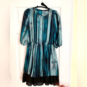 Pleated details, green and black dress by Jessica Simpson; size 6